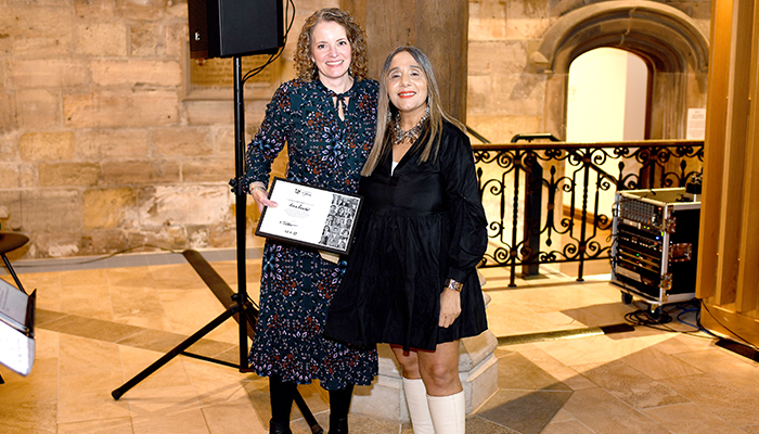 Anna Reader (left) was presented with her award by Pro-Vice-Chancellor for Partnership and Engagement Kiran Trehan (right)